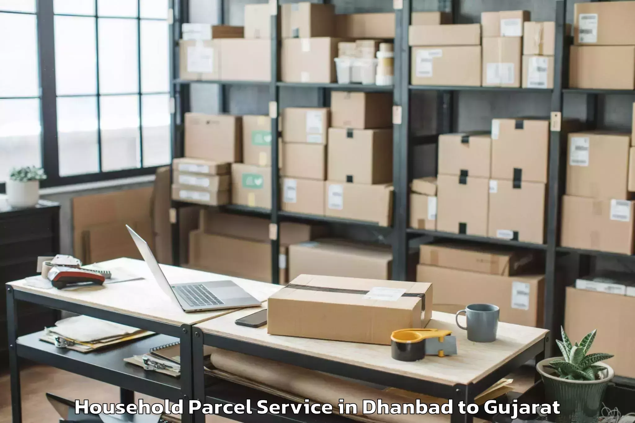 Easy Dhanbad to Shilaj Household Parcel Booking